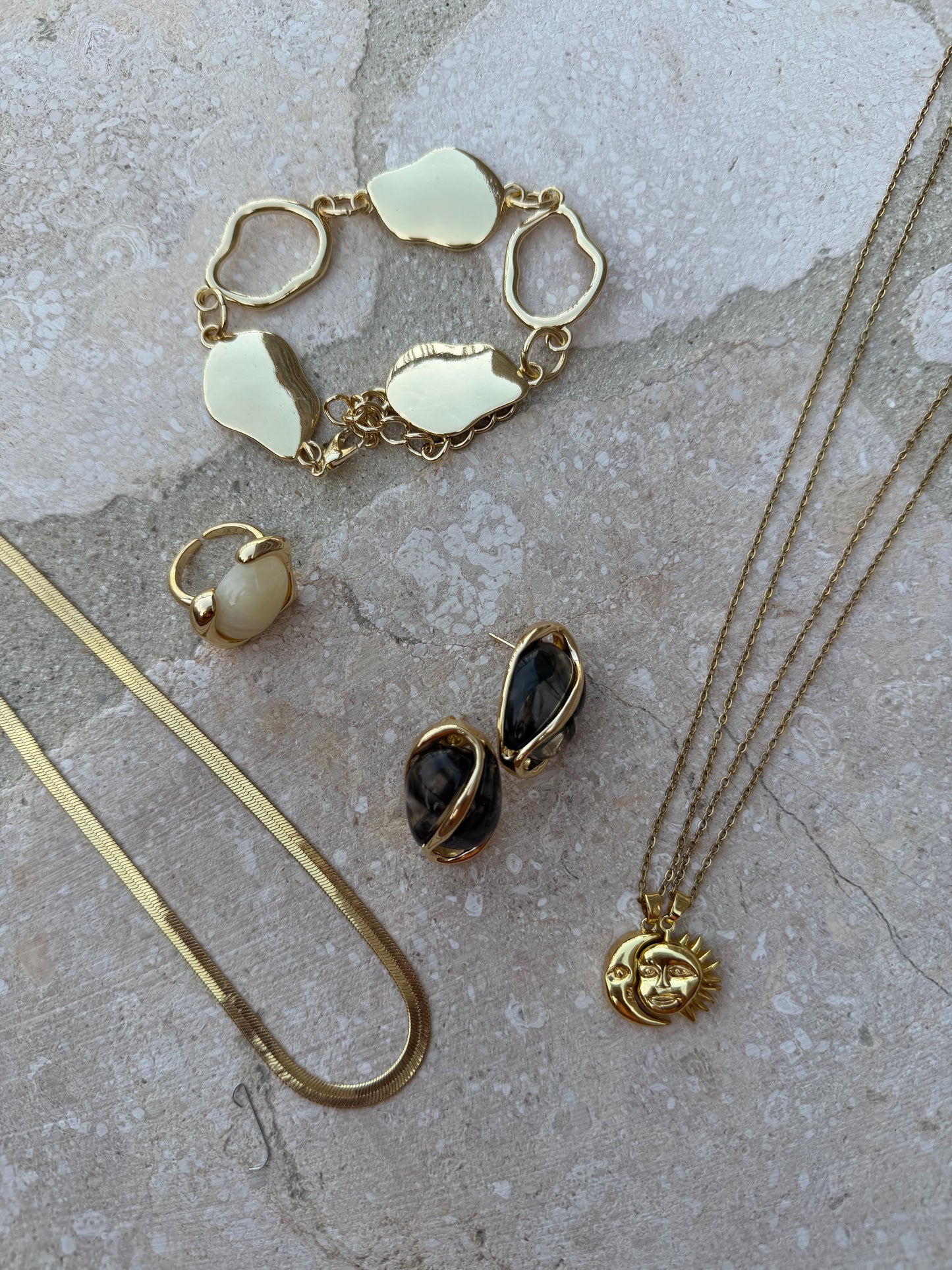 Earring black and gold